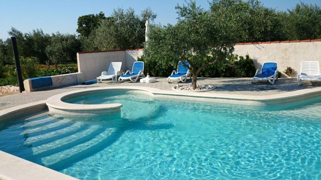 Apartments Villa Oliva Перой Экстерьер фото