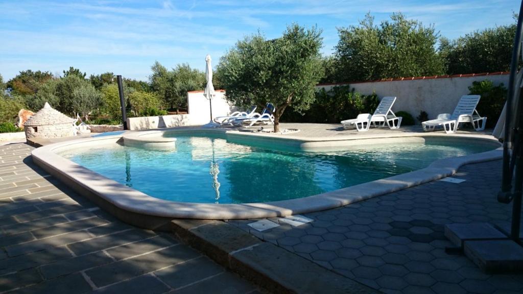 Apartments Villa Oliva Перой Экстерьер фото